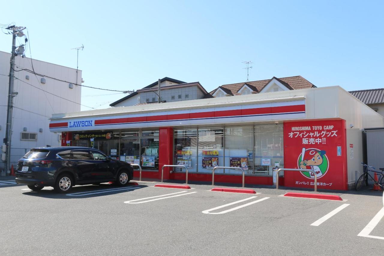 Red Helmet House & Sports Bar Hiroshima Vandrehjem Eksteriør billede